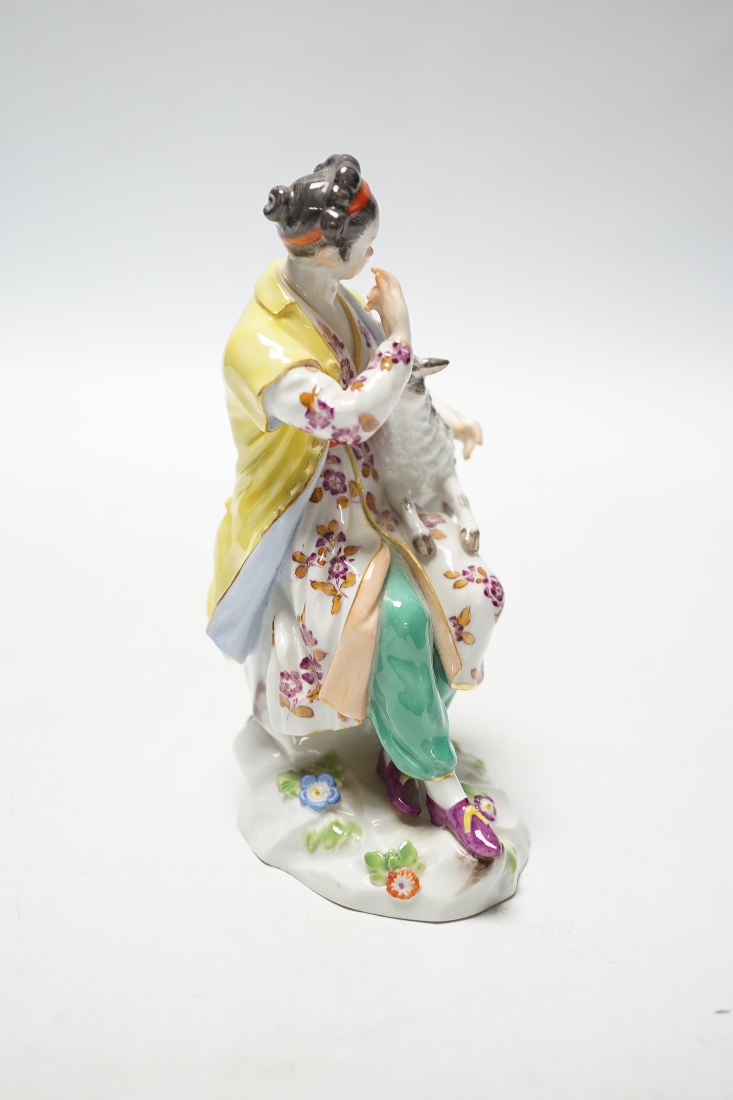 A Meissen group of a girl with a lamb, 20th century, 12.5cm